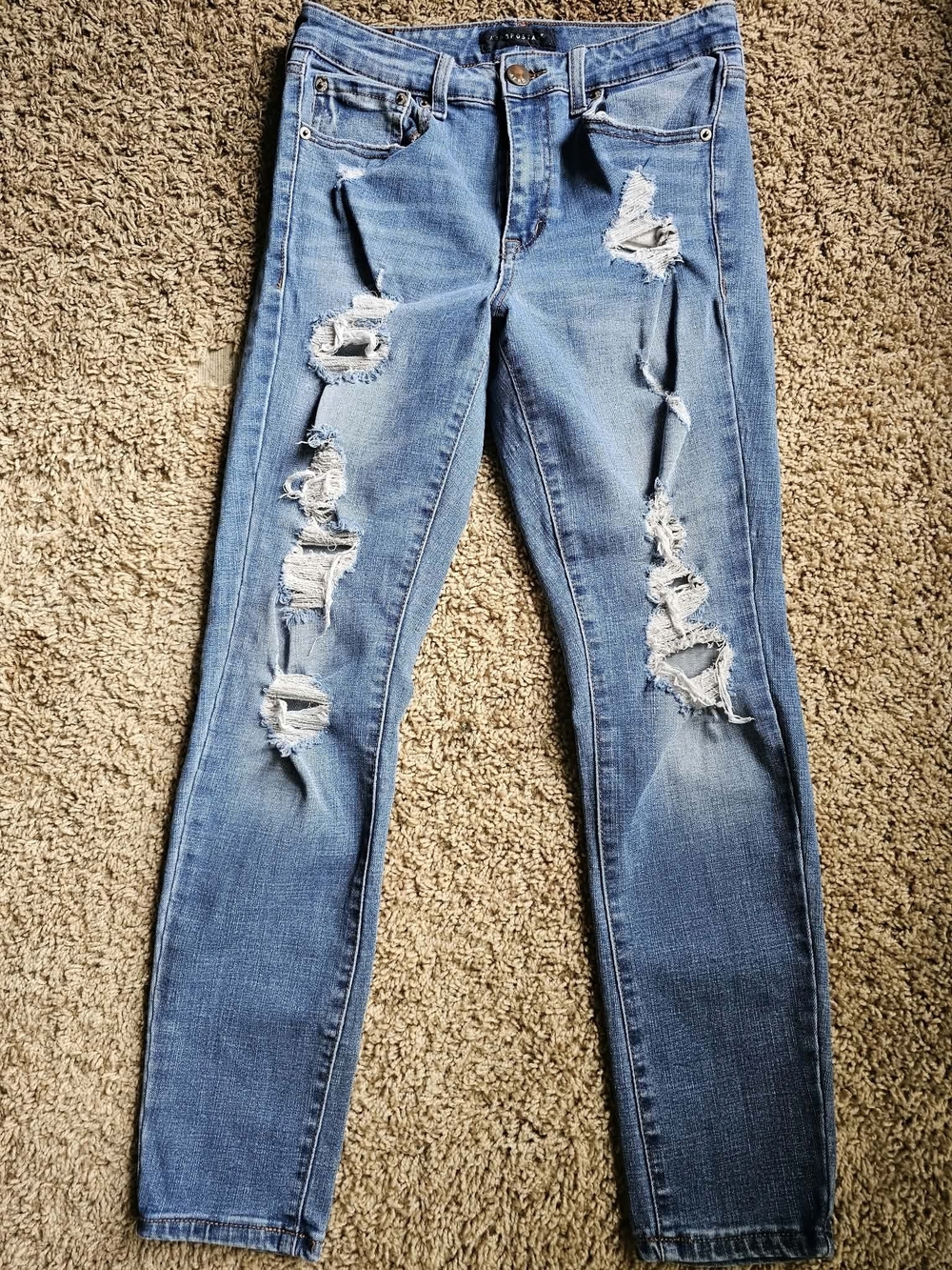Women’s Light Blue Distressed Skinny Jeans